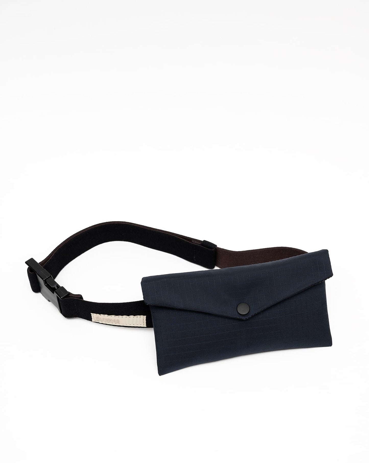 Front view of a midnight blue Cordura Belt Bag by Šumska, highlighting the durable fabric and compact design.