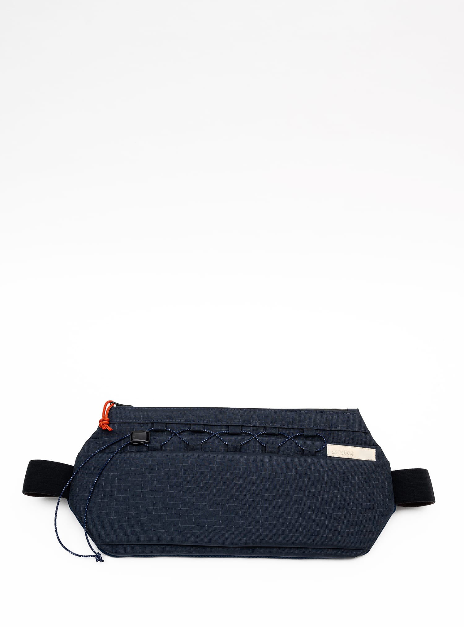 Front view of the Šumska midnight blue Cordura sling bag with a vibrant solar orange zipper pull, showcasing its minimalist design and durable Cordura construction.