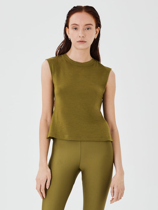 Close-up view of a women's olive green merino wool sleeveless T-shirt by Šumska, showcasing the fabric texture and smooth design